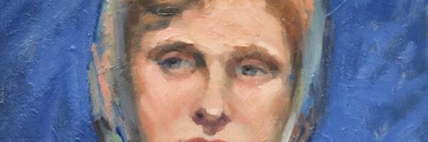 Portrait of a woman wearing a headscarf against blue background